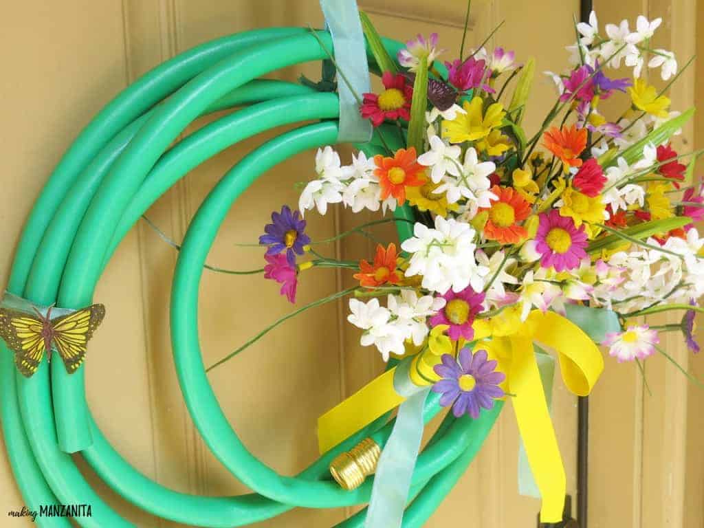 How to Make a Garden Hose Wreath with Blooming Wellies – Home is