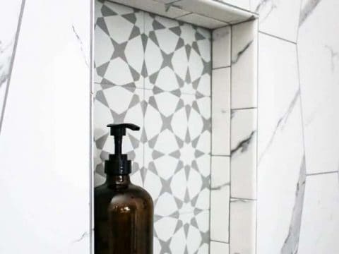 https://www.makingmanzanita.com/wp-content/uploads/2020/09/shower-niche-with-accent-tile-and-amber-glass-bottle-for-shampoo-683x1024-1-480x360.jpg