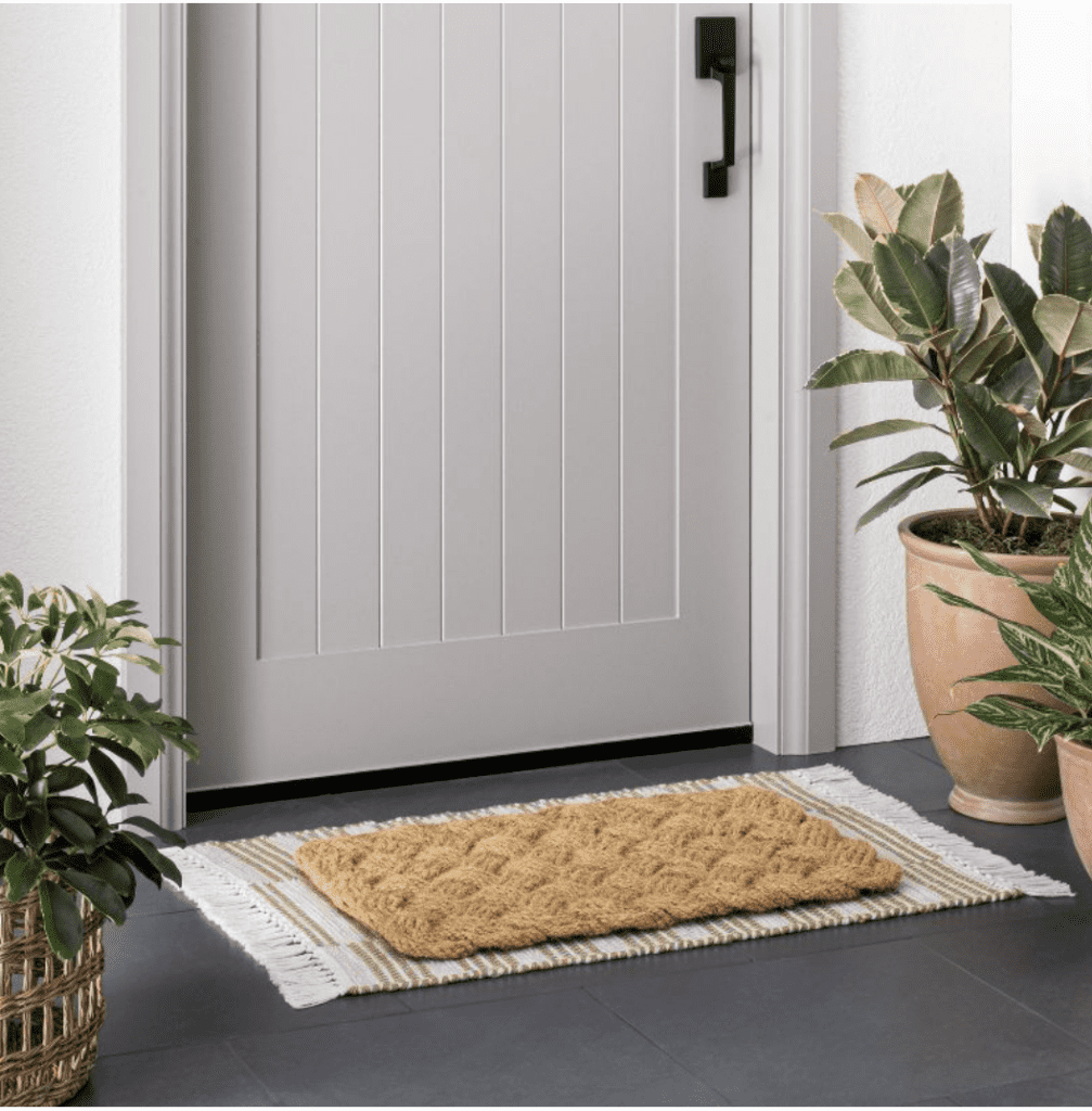 https://www.makingmanzanita.com/wp-content/uploads/2022/03/layered-front-door-mat-with-coir-knotted-mat-from-target-1007x1024.png