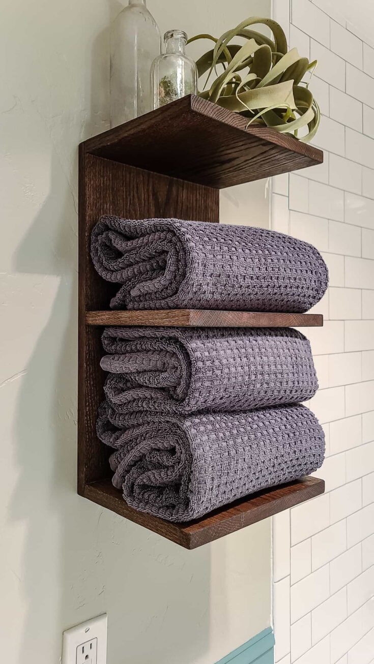 https://www.makingmanzanita.com/wp-content/uploads/2022/07/how-to-build-a-diy-towel-shelf-wall-mounted-735x1306.jpg