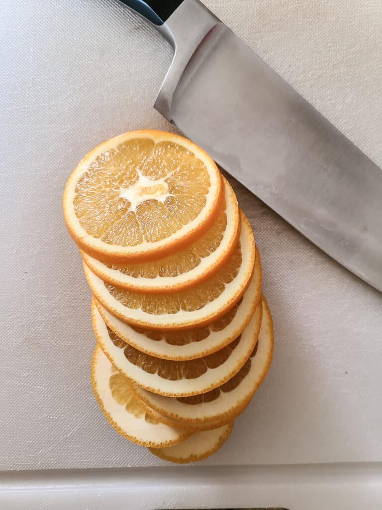 https://www.makingmanzanita.com/wp-content/uploads/2022/11/sliced-oranges-before-dehydrating-for-stovetop-potpourri-gift-768x1024.jpg