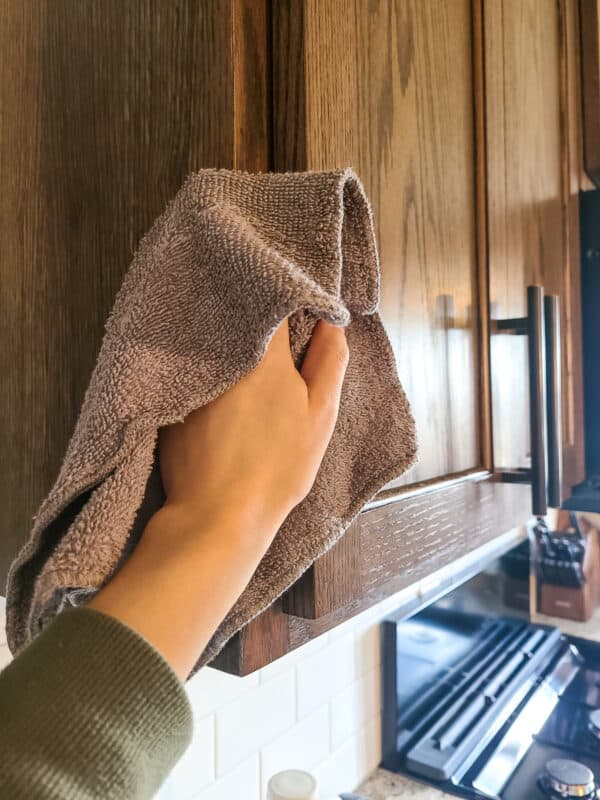 How To Clean Wood Cabinets In Your Kitchen Making Manzanita   Wiping The Outside Of Wood Kitchen Cabinets 600x800 